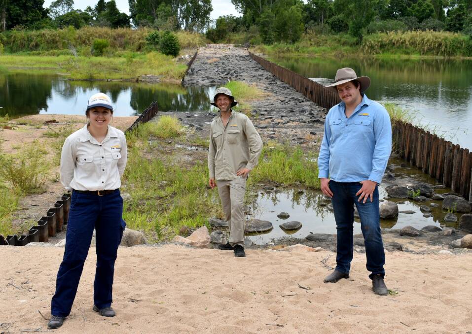 NQ Dry Tropics staff at Giru Weir on the Haughton River project lead Rachael Payne, project officer Thijs Krugers and Waterways, Wetlands and Coasts trainee Fraser Nicholls.