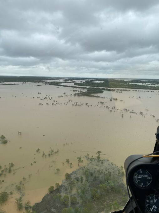 Ergon Energy crews took to the air to assess damaged to the electricity network amid widespread flooding between Normanton and Karumba on Monday.
