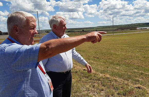 Wagner Corporation Chairman John Wagner outlines the site plan for the proposed Toowoomba Wellcamp Airport quarantine facility to Toowoomba Mayor Paul Antonio.