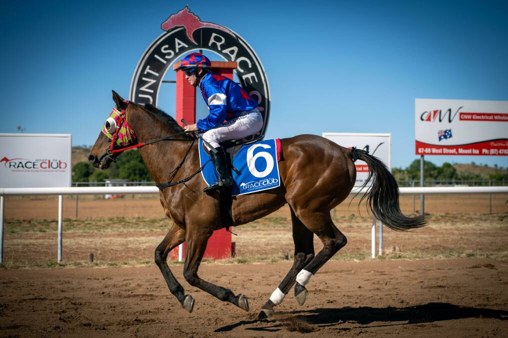 Keith Ballard crossing the line first at Mt Isa for trainer Tanya Parry. Picture: Jason Hoopert