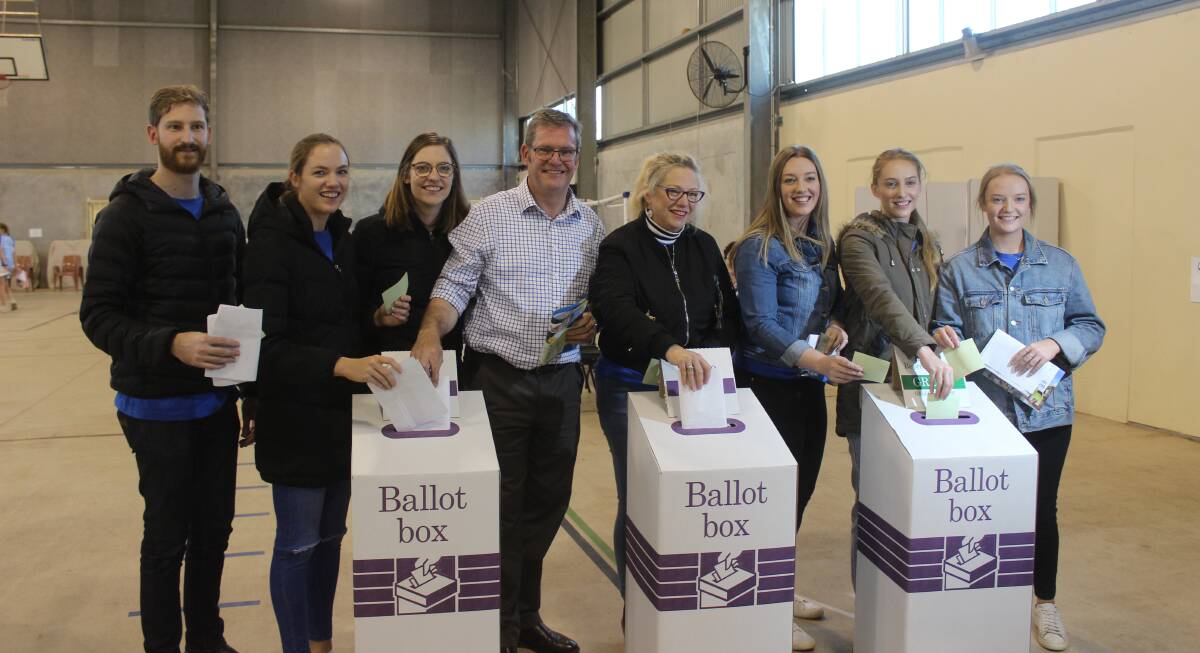 Family affair: The McVeigh family voted at the Bunker's Hill School in the seat of Groom. From left Kevin, Meghan, Bridget, Dr John McVeigh and his wife Anita, Annabelle, Marita and Tess. Picture: Helen Walker
