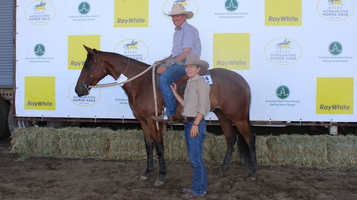 Cheyenne and Deb OBrien, Laglan, Clermont with the top price gelding. Picture: Helen Walker 