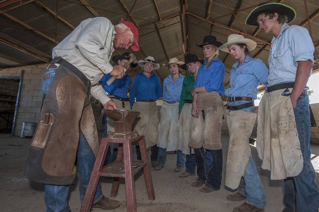 Renowned horseman and former senior horse instructor at the Longreach Pastoral College John Arnold instructing students. Picture: File
