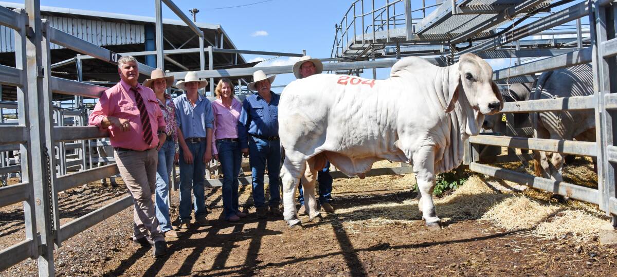Selling agent Brian Wedemeyer, Elders, vendors Holly, Trader, and Melissa Ahern, buyer John Brownson, and vendor Paul Ahern, with Ahern Brock 915/0 (IVF) (H), knocked down for $140,000 on day one of the Rockhampton Brahman Week Sale.
