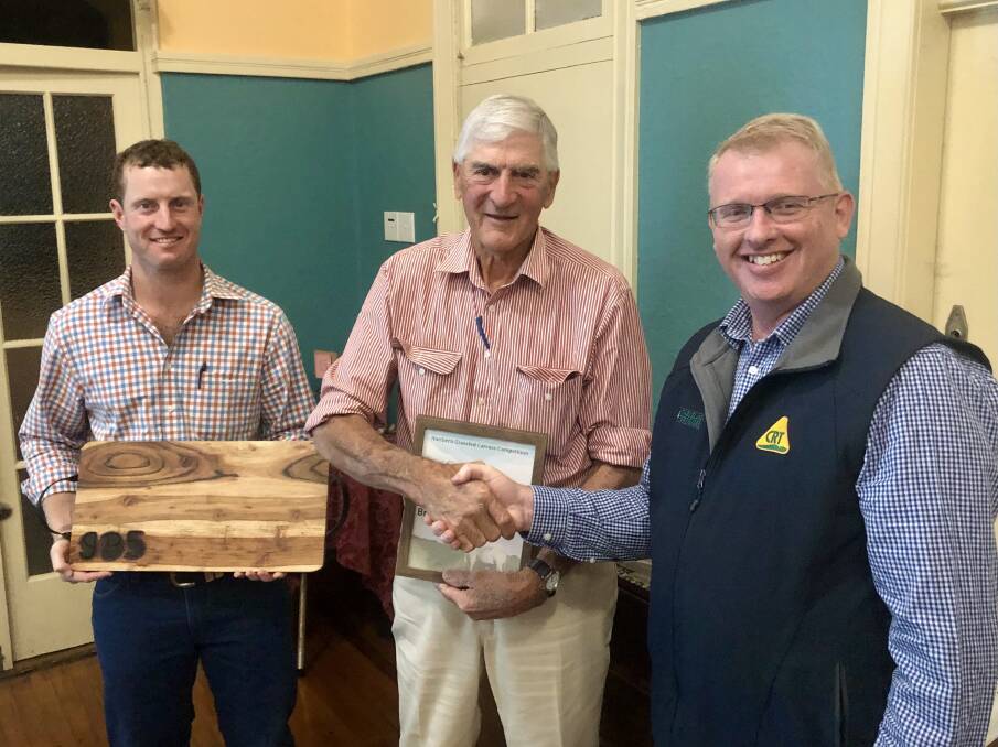 Andrew Carcary, JBS, competition winner Greg Brown, Tolga, with event sponsor Paul Keevers, Tableland Fertilisers, Atherton. The Brown familys pen of Charbray heifers won the 2022 competition.