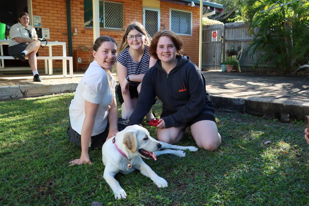 Dempsie Moller, Billie Levett and Taylor West with Aggie, a Smart Pup Assistance Dog. Photo: Supplied 