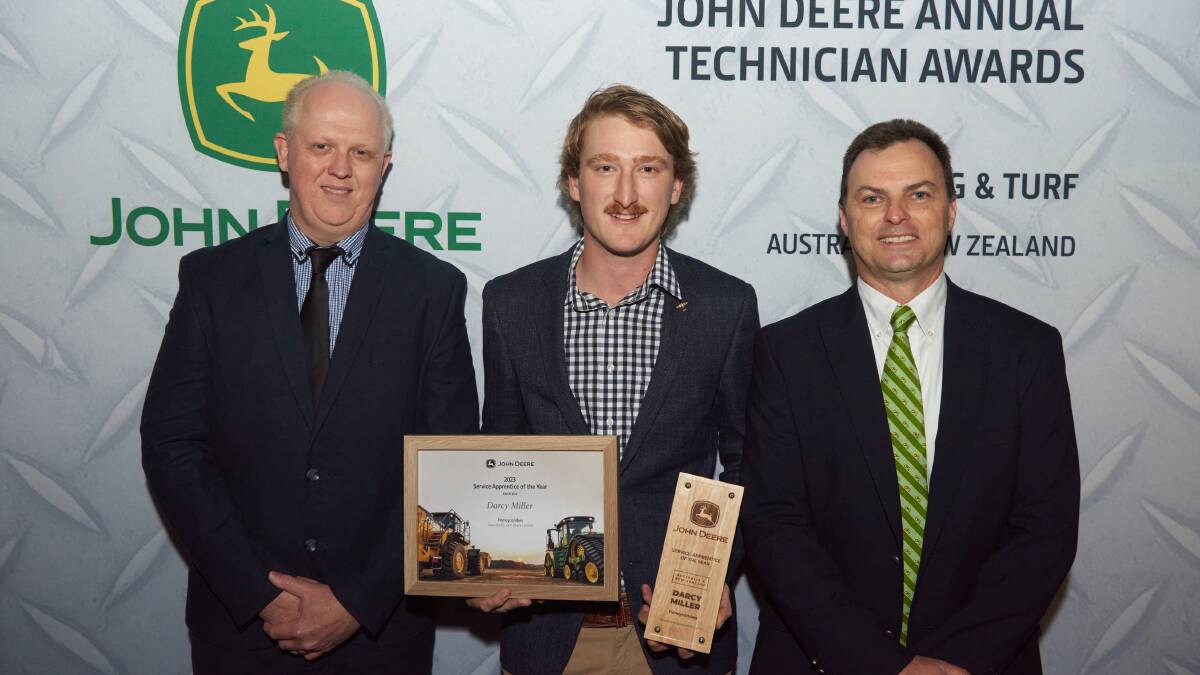 Mark Barrett of Honeycombes with Darcy Miller and Steve Wright, John Deere. Picture: Supplied by Blue Hill PR