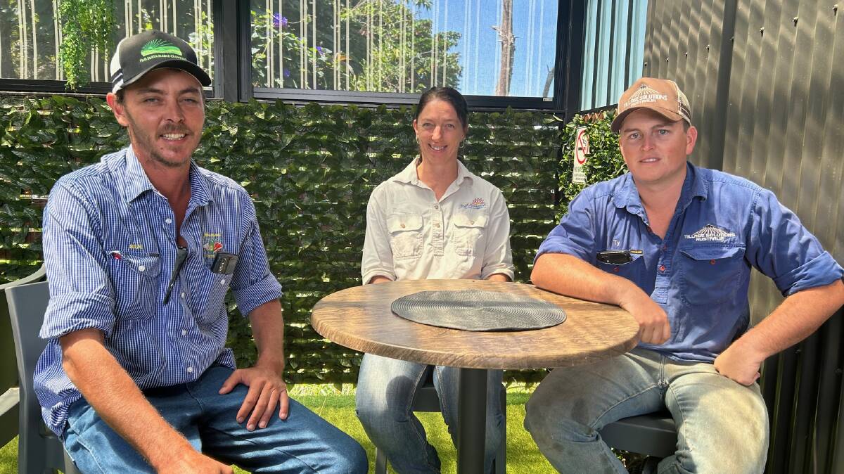 FNQ Sustainable Cropping president Brad Jonsson, left, and vice-president Ty Poggioli, right, with Gulf Savannah NRM project officer Sarah Stevens.
