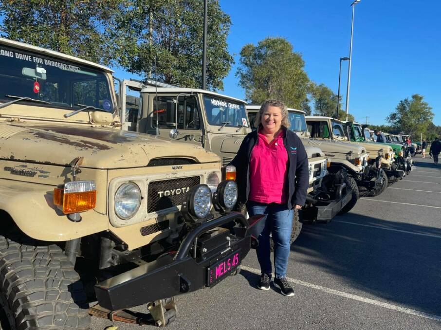 Drought Angels CEO and founder Natasha Johnston with some of the vehicles involved in the charity drive. 