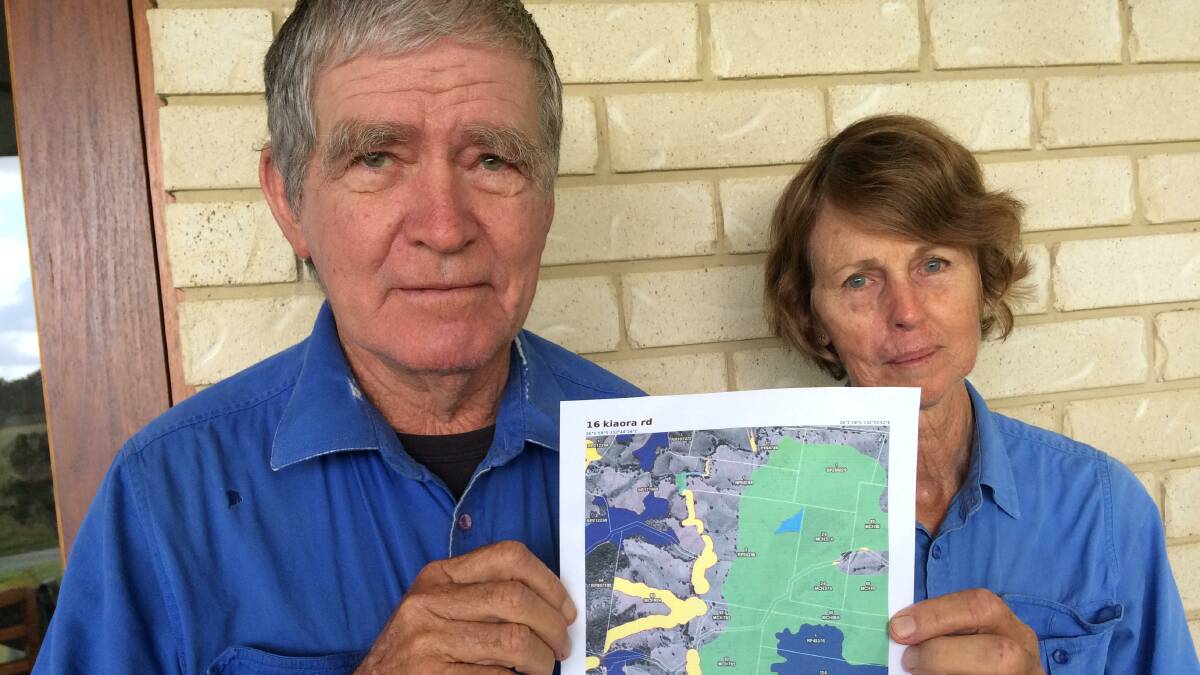 CRUEL BLOW: Gympie district farmers Bill and Sue Blakeney say they are devastated after the sale of their property fell because Queensland Government trigger map.