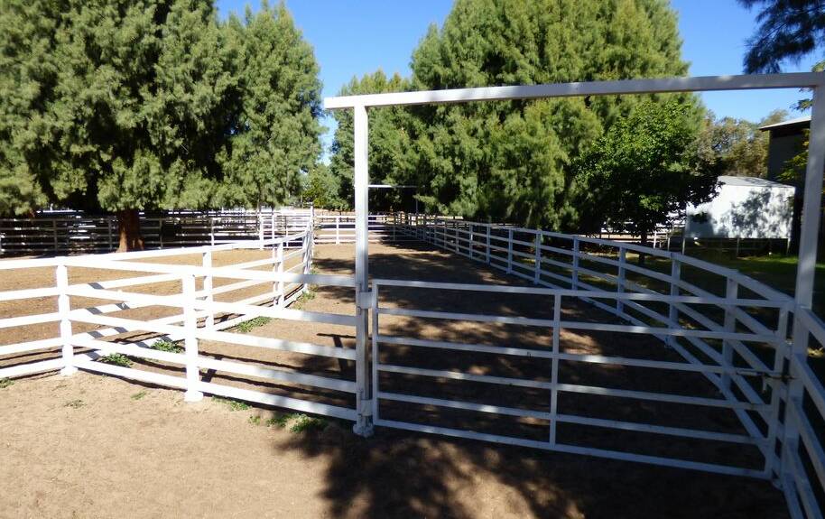 The Charleville property has three sets of steel cattle yards.