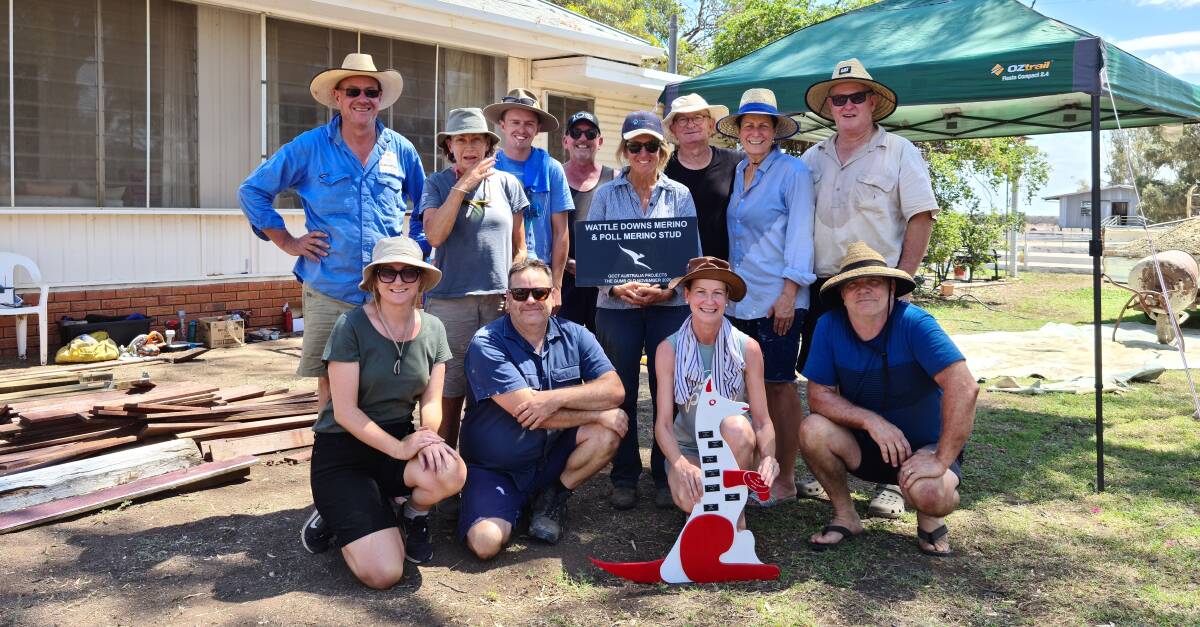 Karen Huskisson (centre), Wattle Downs, The Gums, with the Qantas Cabin Crew Team, who donated some of their holiday time to help out on this and other drought affected farms. Picture supplied.
