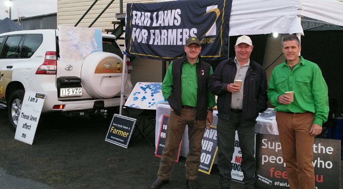 SPREADING THE WORD: AgForce senior adviser Andrew Freeman, Dave Clark and AgForce chief executive officer Michael Guerin at the Caboolture Markets.