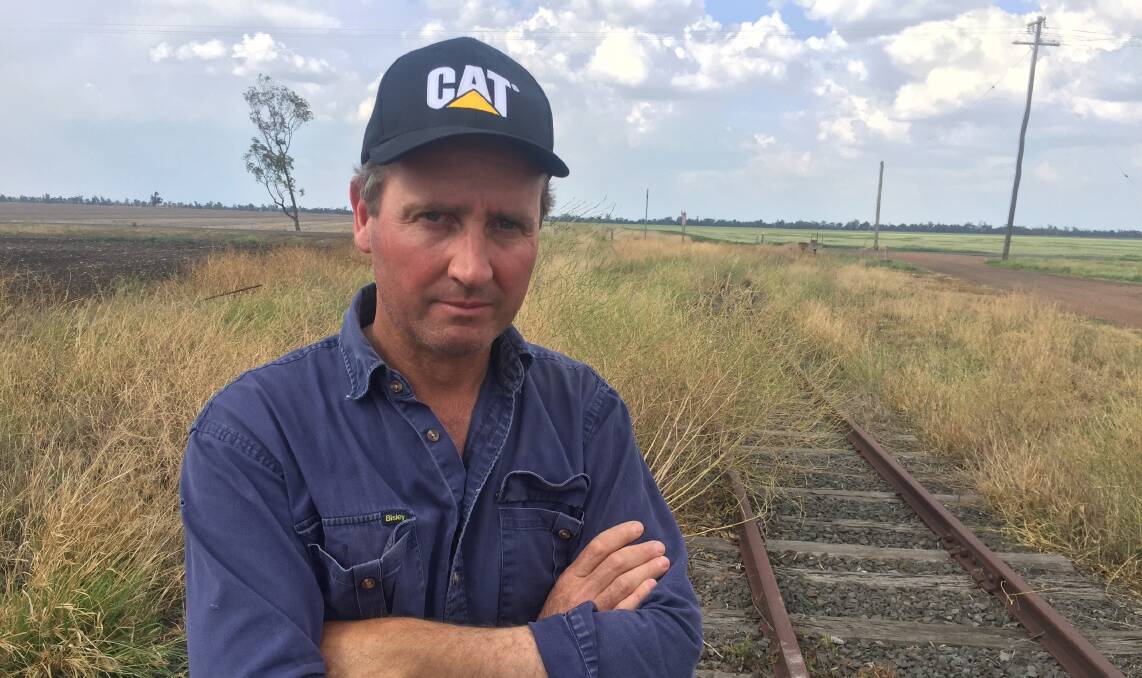 Condamine floodplain farmers like Jason Mundt remain unconvinced the Inland Rail will not interfere with flood waters.