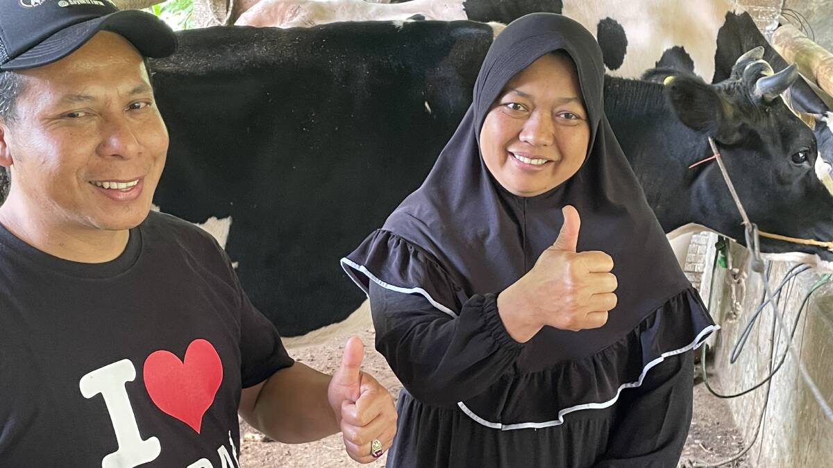 Indonesian dairy farmers Joko Purnomo and his wife Diah Sustanti are benefiting from the global push by developed countries to decarbonise their economies. Picture - Mark Phelps