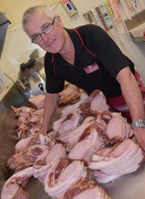 Des Barritt, Barritt’s Butchery, Bundaberg, with his award winning bacon. Photo - Ashley Warmsley
