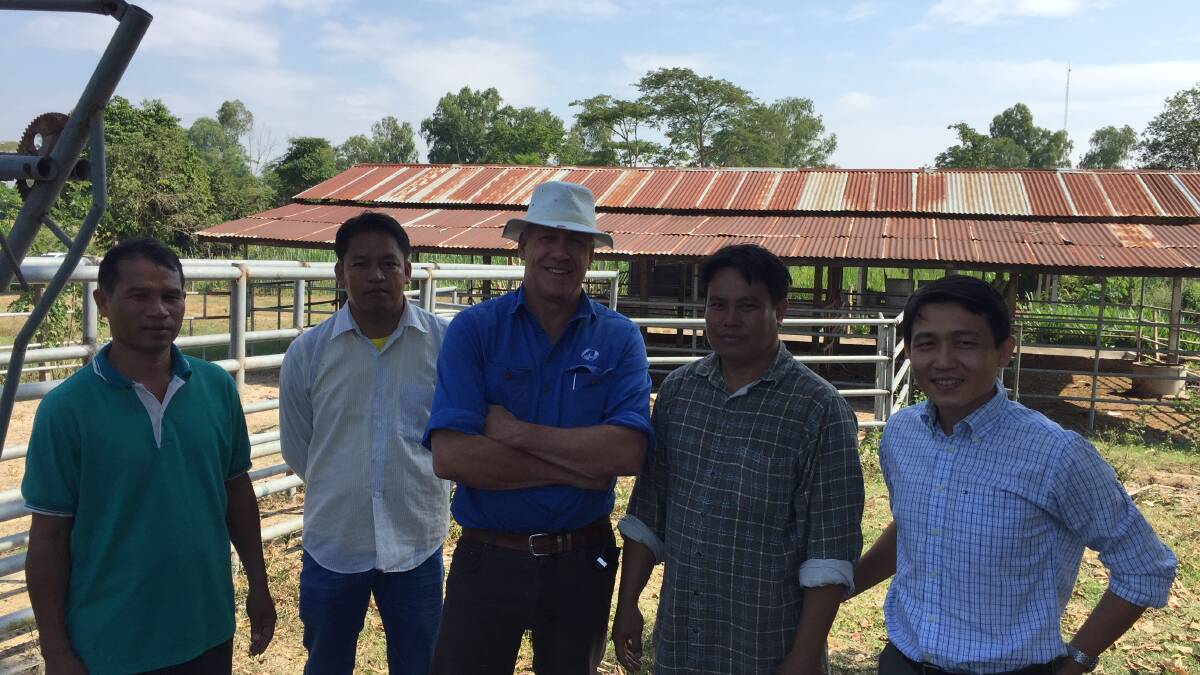 SOUTH EAST ASIA: Mr Bounthavone, Mr Lathaphone, Chick Olsson, Four Season Company, with Mr Phouthone and Laos agricultural consultant Mr Sonevilay at the NAFRI research station near Vientiane.