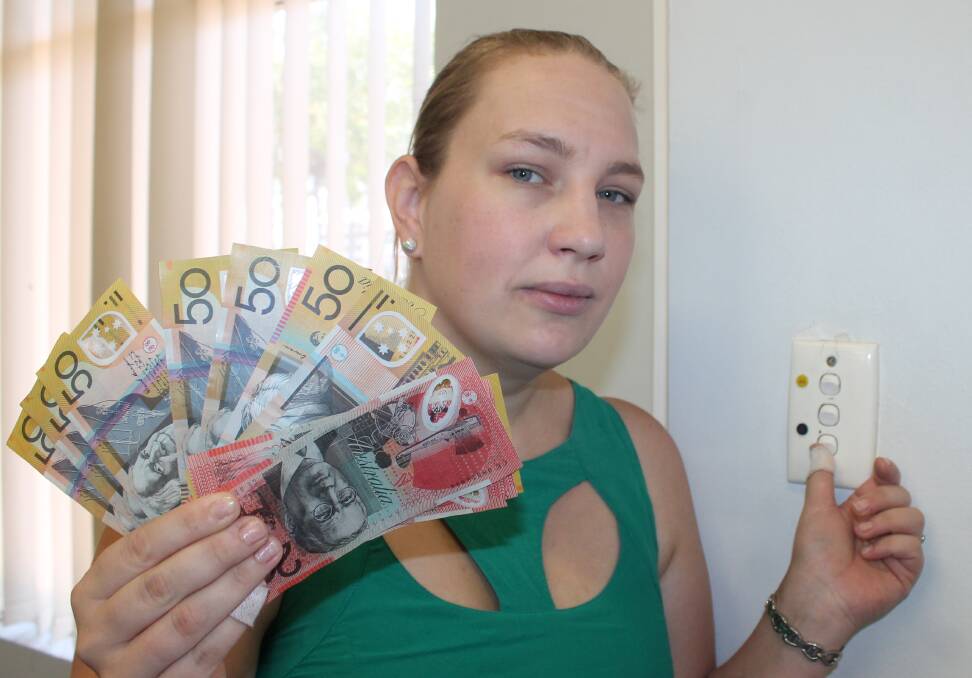 Katherine mother Anthea Moniz pays double the price for electricity in Katherine than she did in Victoria. 